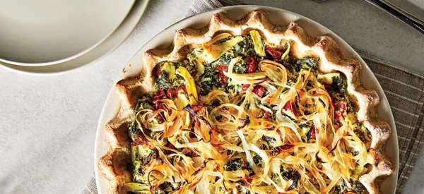 Quiche Florentine with artichoke hearts and sun-dried tomatoes 