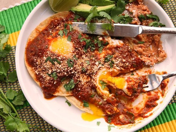 Quick and easy huevos rancheros with tomato-chili salsa