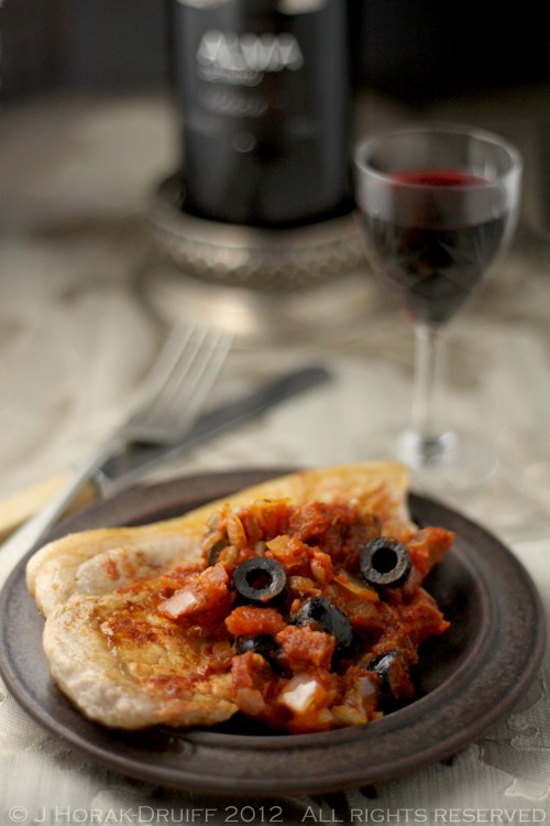 Quick pork chops with a tomato, chorizo & olive relish