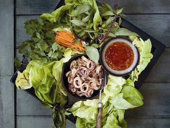 Quick squid with red chile sauce and herbs