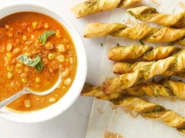 Quick summer tomato soup with pesto breadsticks