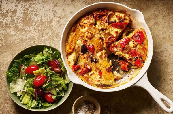 Quick veg frittata with feta, olives & salad