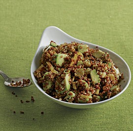 Quinoa and avocado salad with dried fruit, toasted almonds, and lemon-cumin vinaigrette