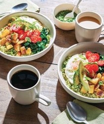 Quinoa breakfast bowls with potatoes, spinach, and pesto