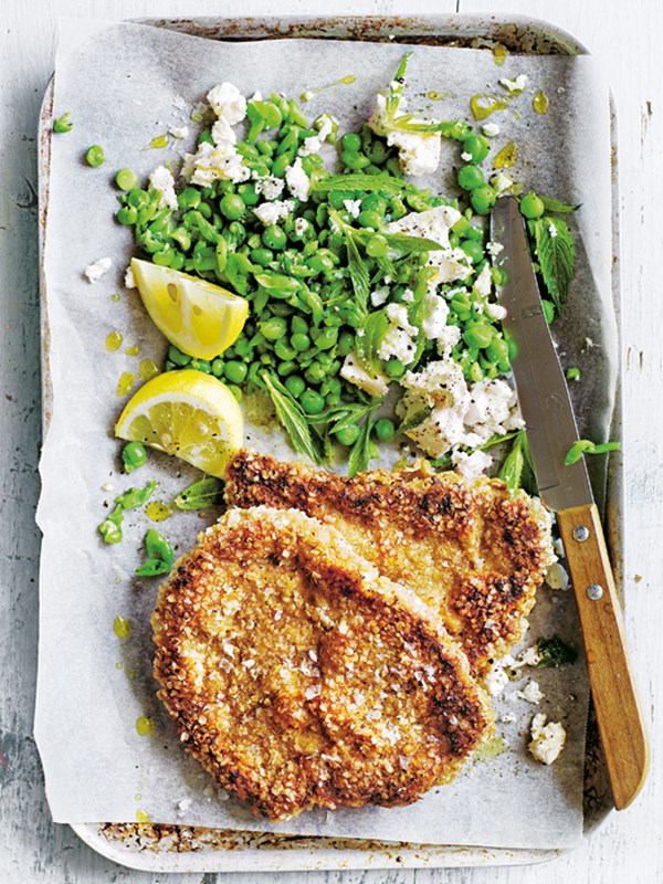 Quinoa-crusted veal schnitzel with pea, mint and feta smash