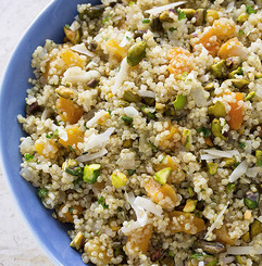 Quinoa pilaf with apricots, aged Gouda, and pistachios