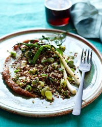 Quinoa salad with grilled scallions, favas and dates