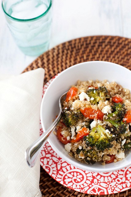 Quinoa salad with roasted tomatoes, broccoli and feta