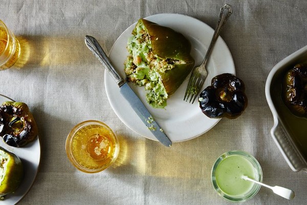 Quinoa-stuffed bell peppers with basil sauce