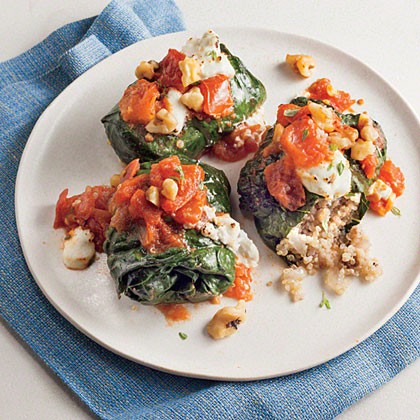Quinoa-stuffed kale rolls with goat cheese