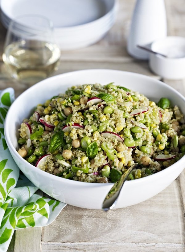 Quinoa, sweet corn and edamame bean salad with honey, lime and basil dressing