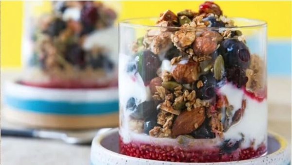 Quinoa with granola, black fruit and yoghurt