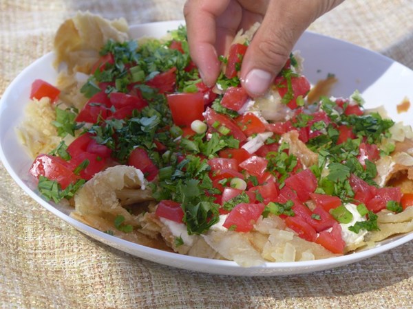 Qurutob on flaky flatbread (fatir)