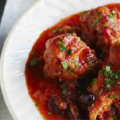 Rabbit in white wine, rosemary, olive and tomato sauce (Coniglio alla cacciatore)
