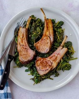 Rack of lamb on a bed of spinach
