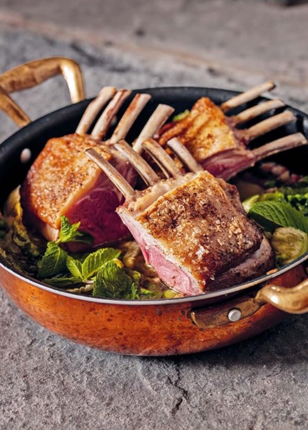 Rack of lamb with baby gem lettuce, peas, mint and bacon