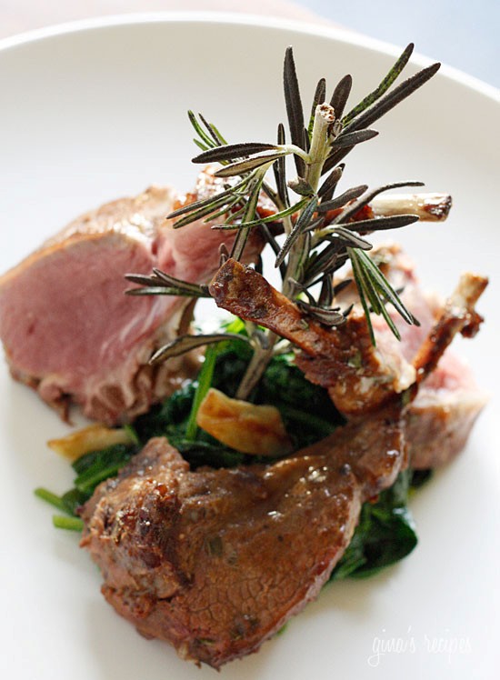 Rack of lamb with Dijon glaze over wilted baby spinach