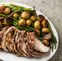 Rack of pork with potatoes and asparagus