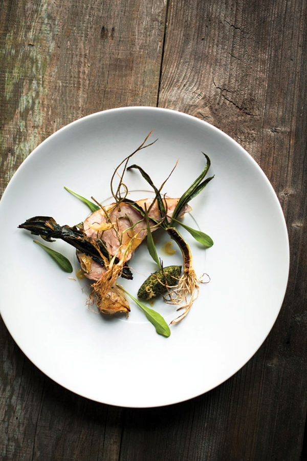 Rack of veal roasted in dandelion butter, spring onions with ocean persillade