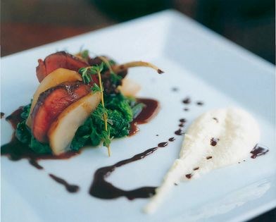 Rack of venison, buttered greens and chocolate oil