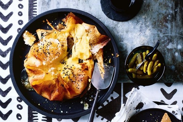 Raclette in brik pastry with rosemary and black garlic