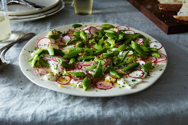 Radish, snap pea, and burrata salad with chives and lemon