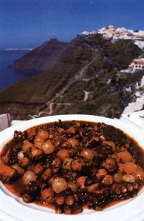 Ragout of octopus with onions and tomatoes 