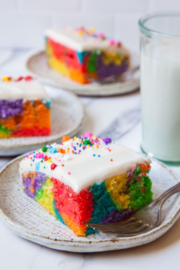 Rainbow sheet cake with cream cheese frosting