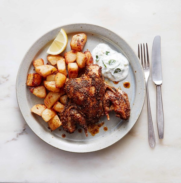 Rajasthani-spiced game bird with roasties and raita