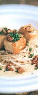 Ramen noodles with creamed sesame sweetcorn, crisp tofu and toasted walnuts