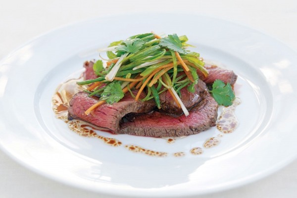 Rare beef with green salad garnish