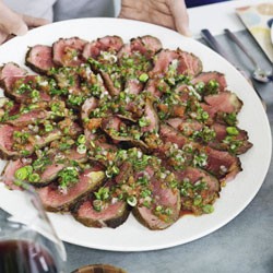 Rare roast beef sirloin with tomato salsa