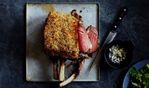 Rare roasted beef rib with a horseradish mustard and thyme crust