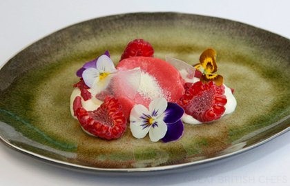 Raspberries with violet and oatmeal