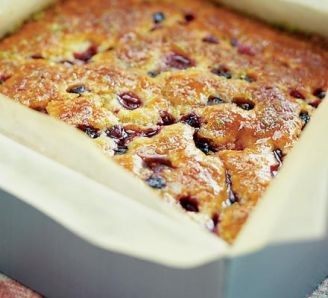 Raspberry and blueberry lime drizzle cake