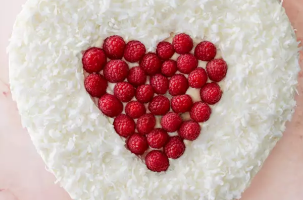 Raspberry-and-custard-filled vanilla heart cake