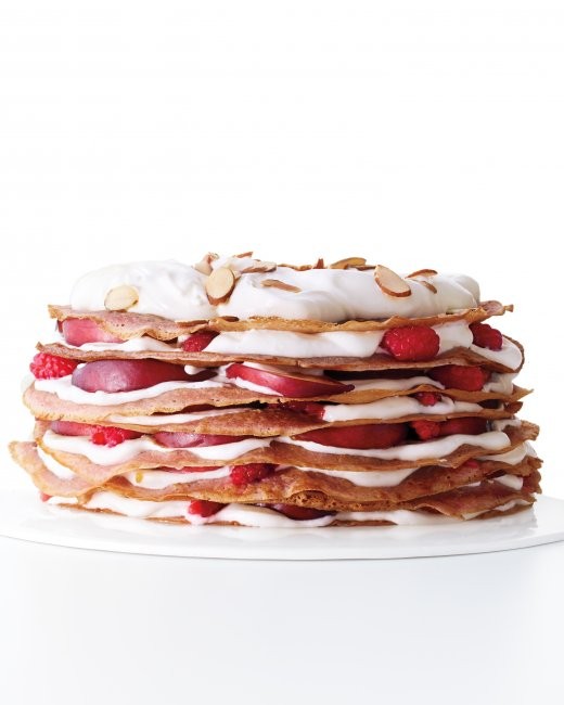 Raspberry crêpe cake with nectarines and cream