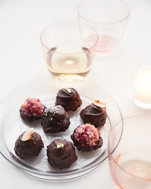 Raspberry macaroons in chocolate shells