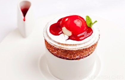 Raspberry soufflé with buttermilk ice cream and raspberry and mint coulis