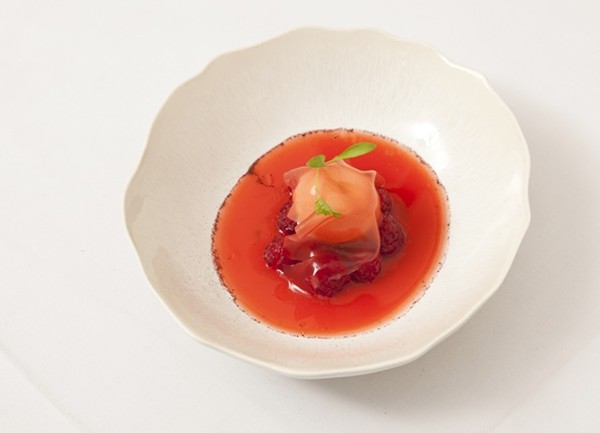 Raspberry soup with raspberry jelly and milk ice cream
