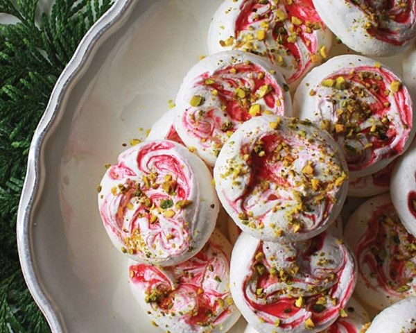 Raspberry swirl pistachio meringue cookies