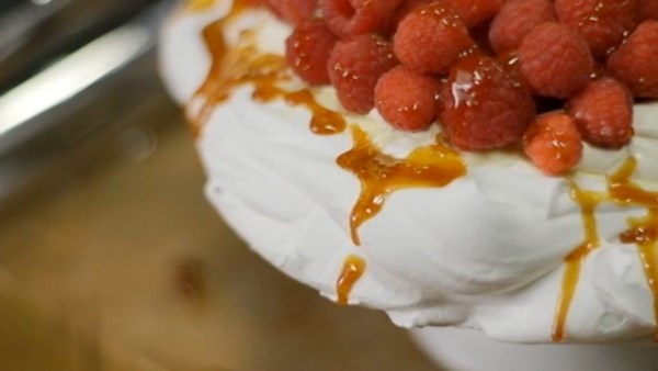 Raspberry, white chocolate and caramel Pavlova