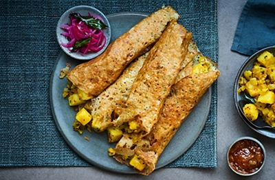 Rava dosa with turmeric potatoes