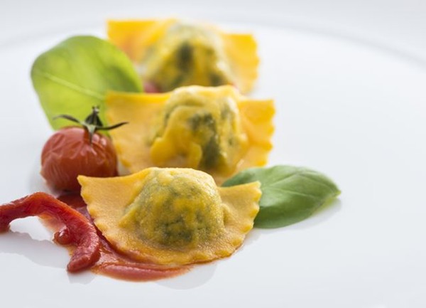 Ravioli with sheep's milk ricotta, spinach, tomato sauce and basil