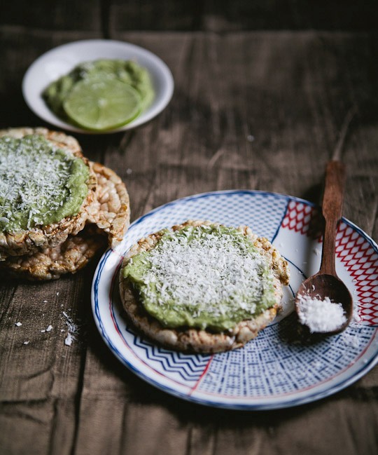 Raw avocado lime mousse on rice cakes