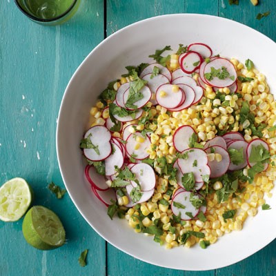 Raw corn salad with radishes, jalapeño and lime