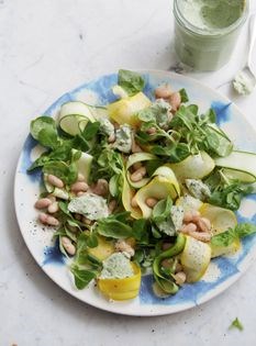 Raw courgette salad with 'ricotta', cannellini beans and preserved lemon dressing