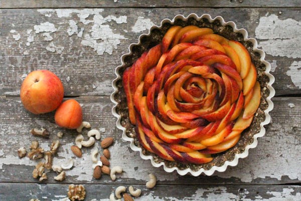 Raw peach tart with coconut whipped cream