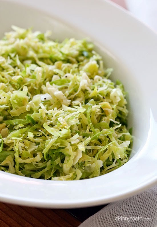 Raw shredded Brussels sprouts with lemon and oil