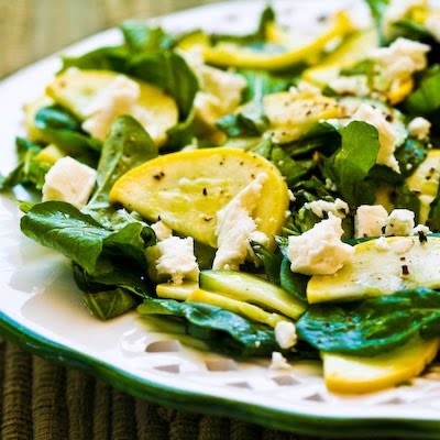 Raw summer squash salad with arugula, feta, and herbs